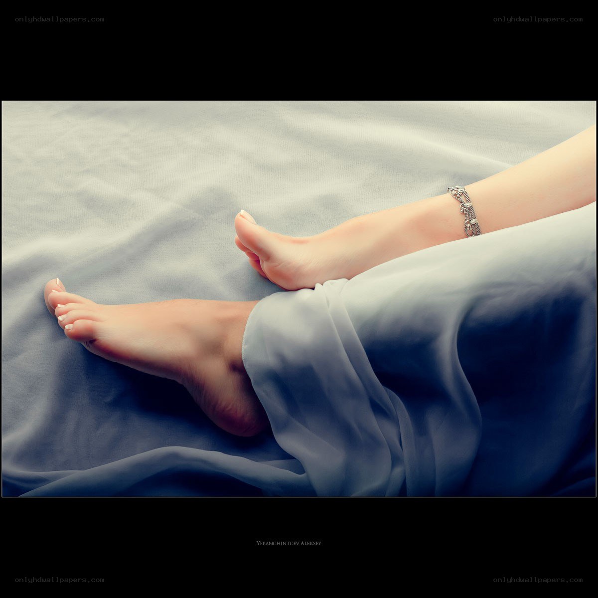 feet on soft fabric