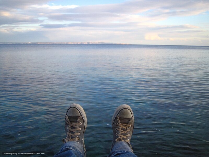 Feet on the edge of the sea