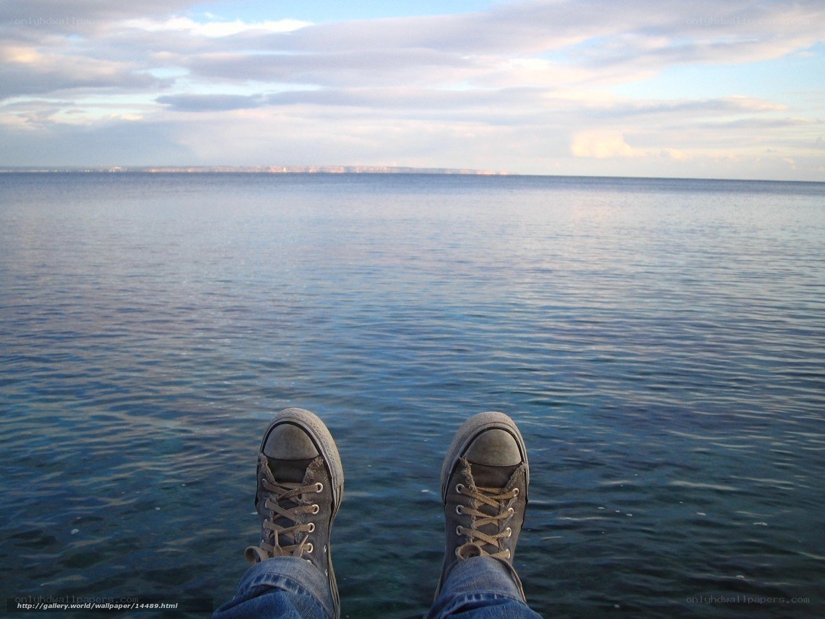 Feet on the edge of the sea