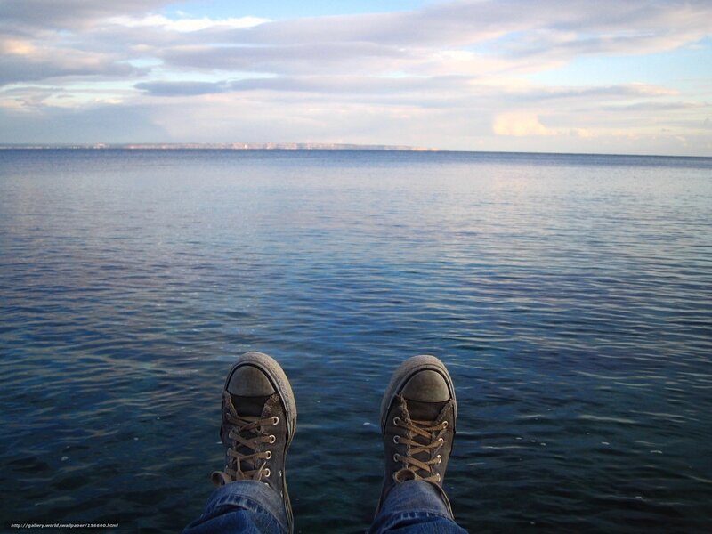 feet on the water's edge