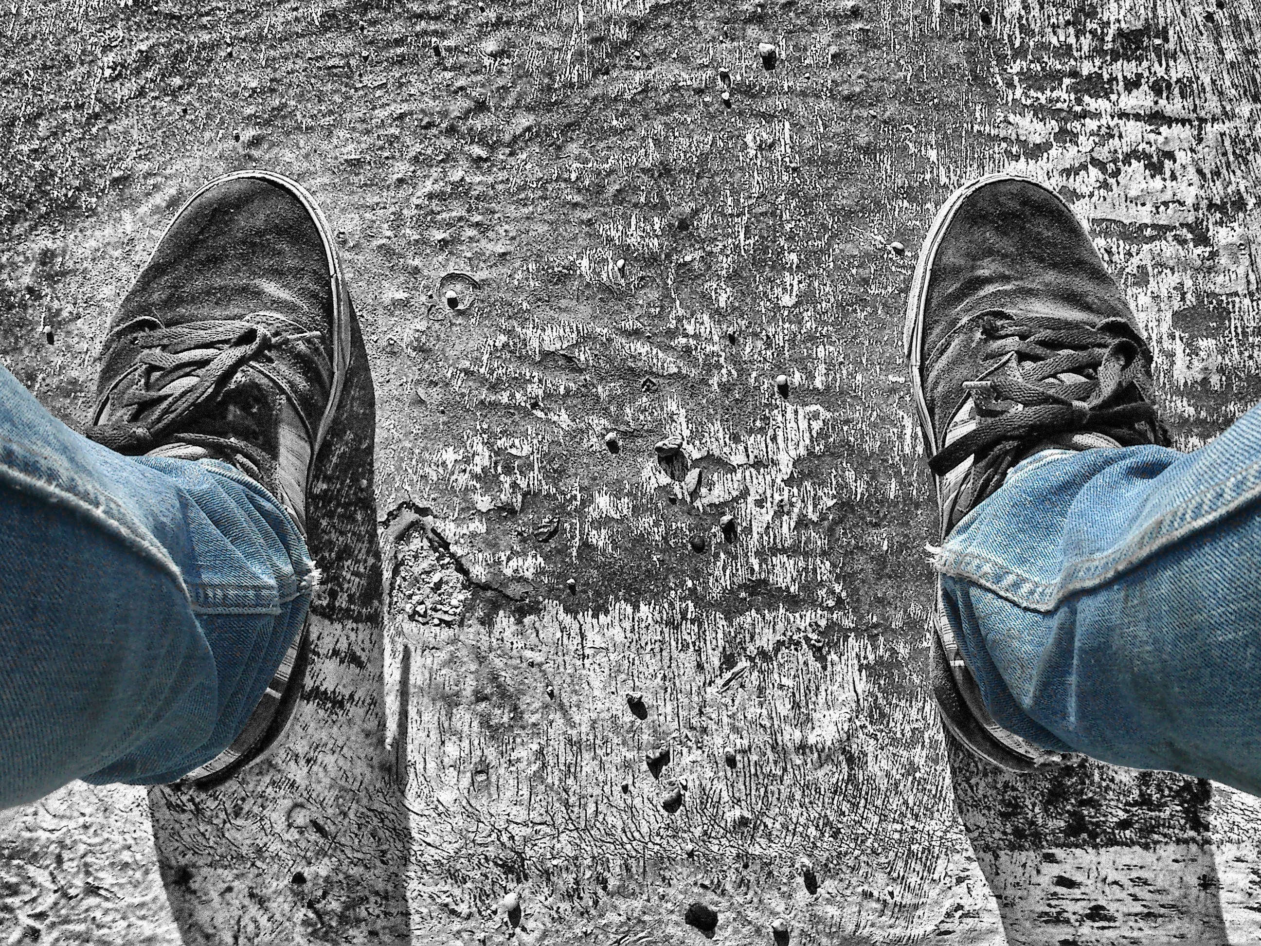 feet on weathered wood