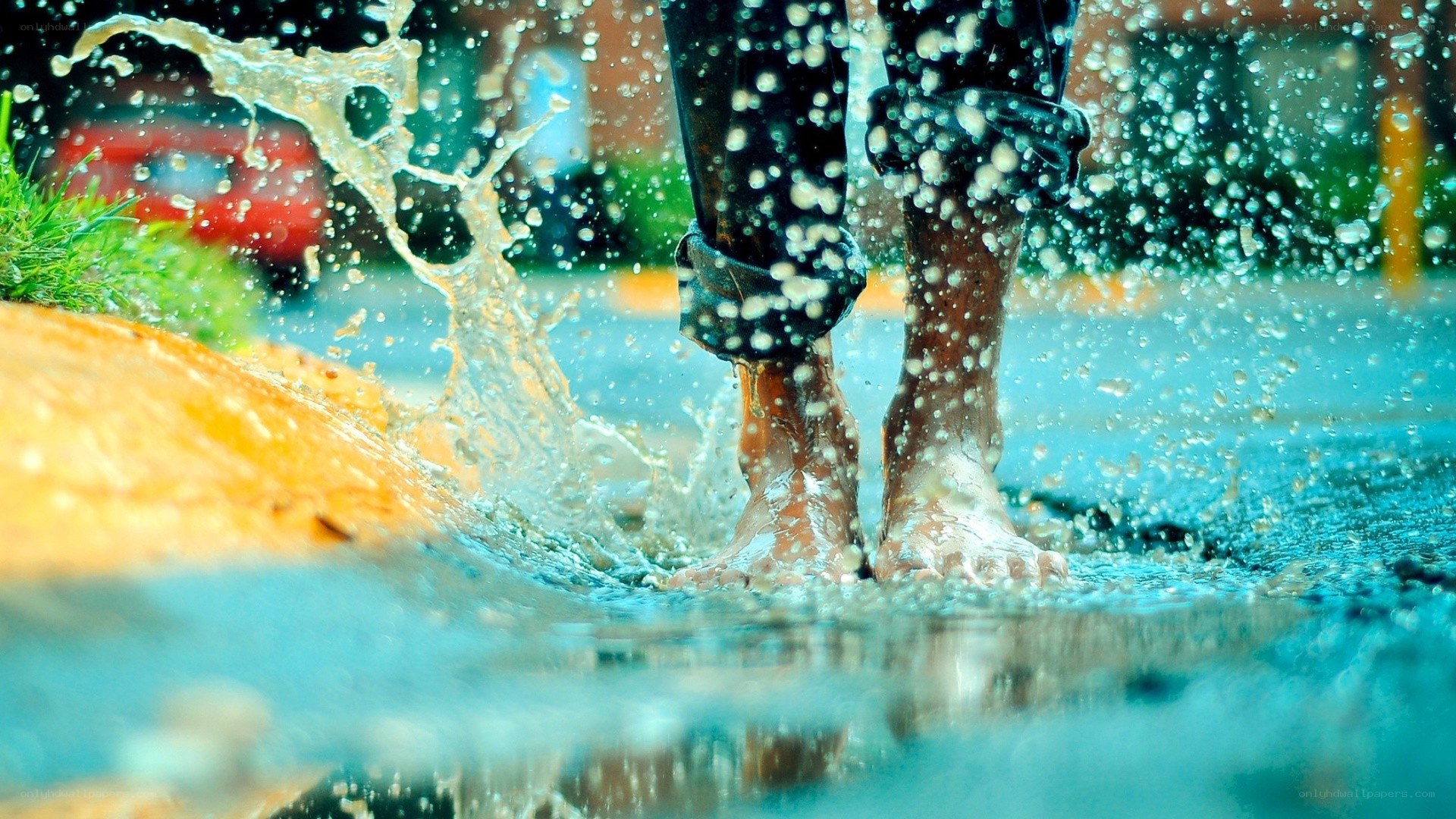 feet splashing in a puddle