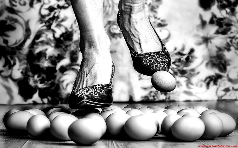 Feet stepping on eggs