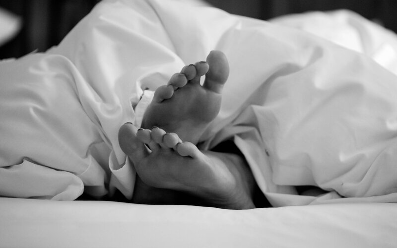 Feet under Blanket