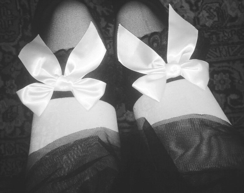feet with bows on shoes