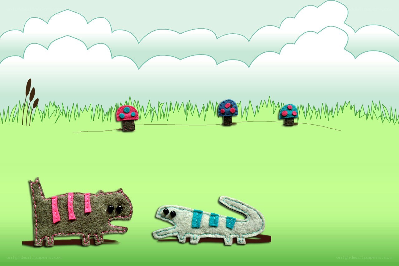 felt animals in a field