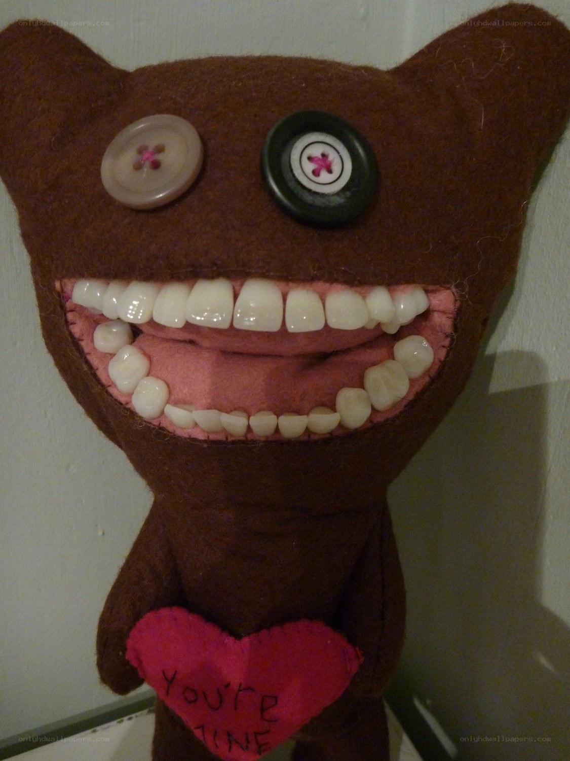 Felt monster with heart