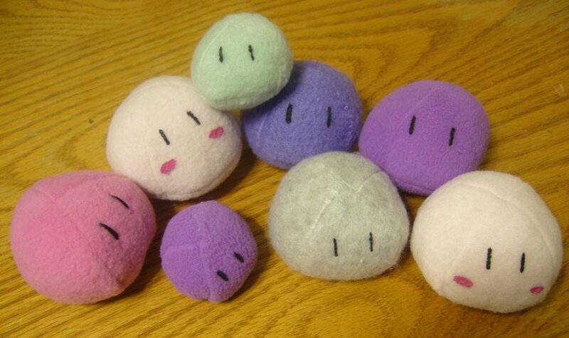 Felt plush characters on wood