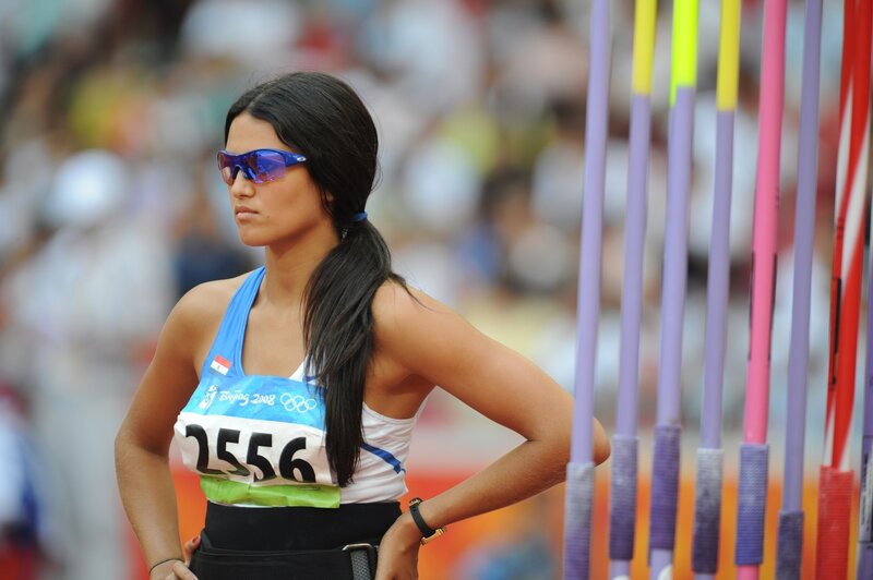 Female Athlete in Uniform — Blue, Focused