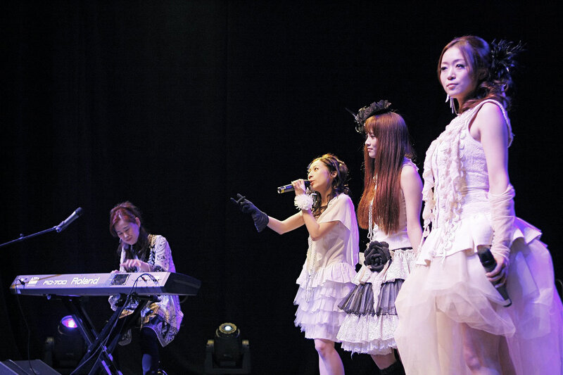 Female band performing on stage