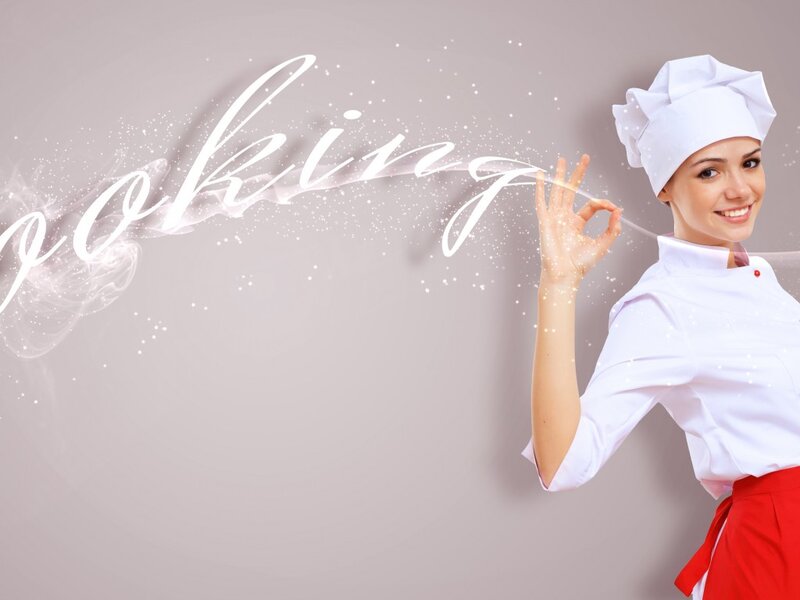 Female Chef Making Sign