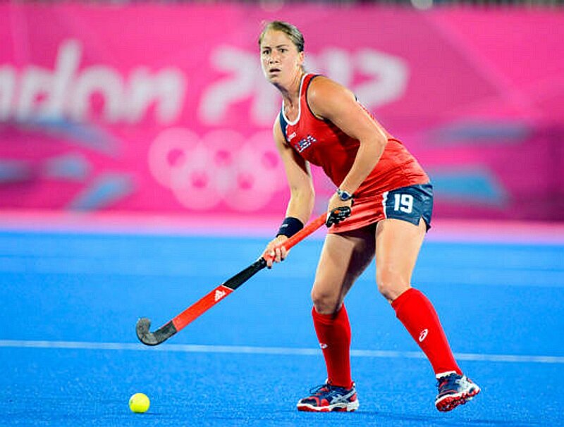Female Field Hockey Player — Blue
