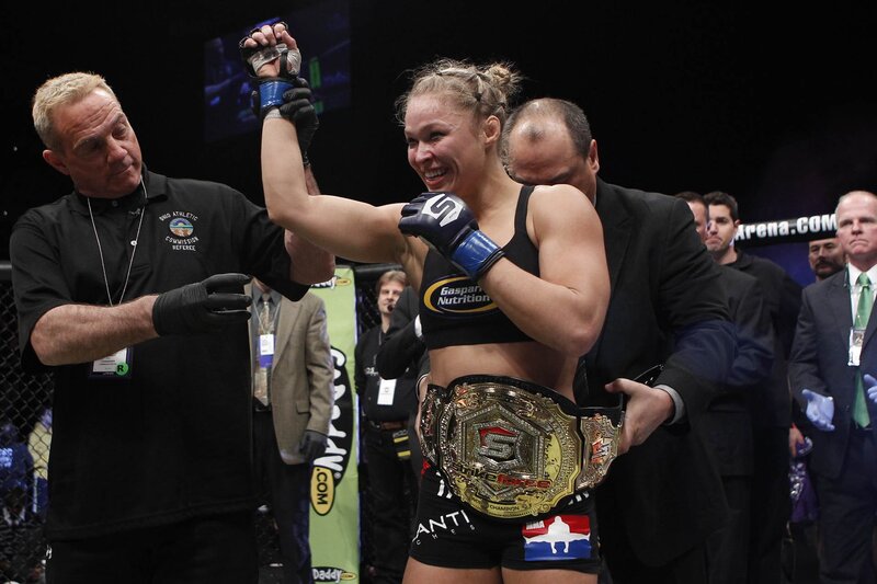 Female fighter celebrates victory