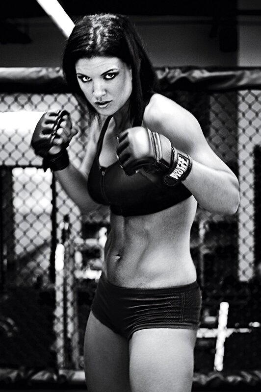 female fighter in cage