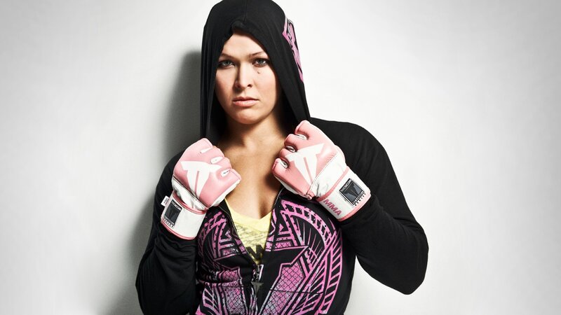 female fighter in pink gloves