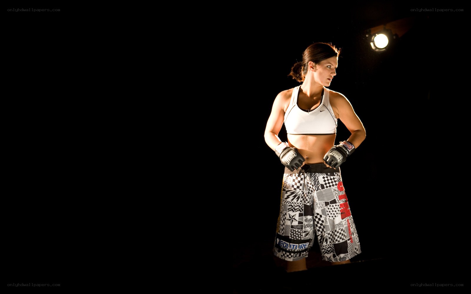 female fighter in spotlight
