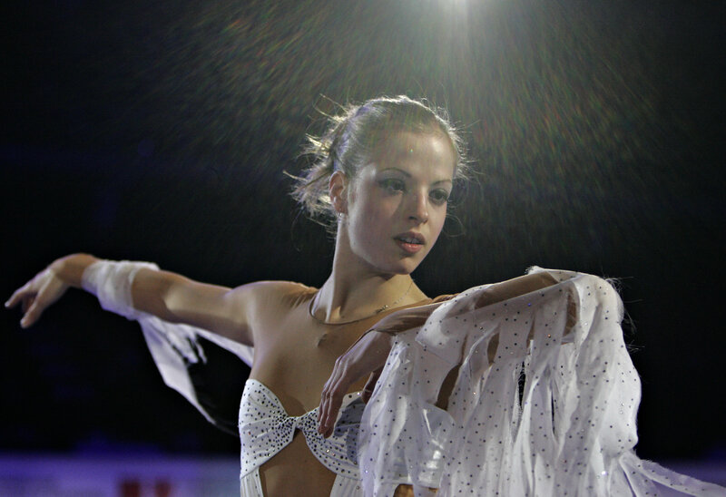 Female Figure Skater — White, Dramatic, Night