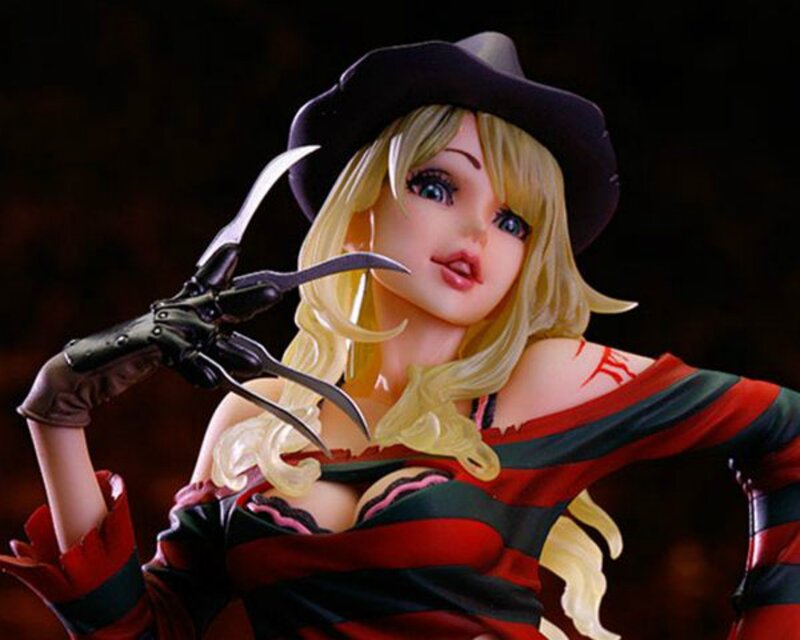 Female Figure with Bladed Glove
