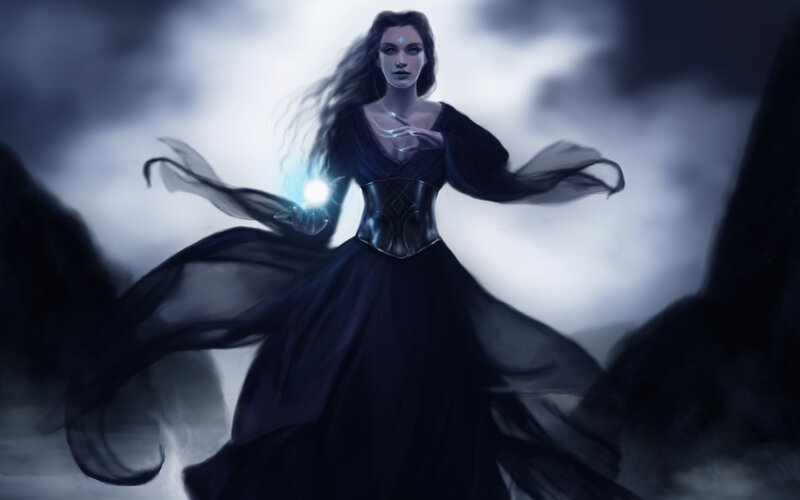 female mage with glowing orb