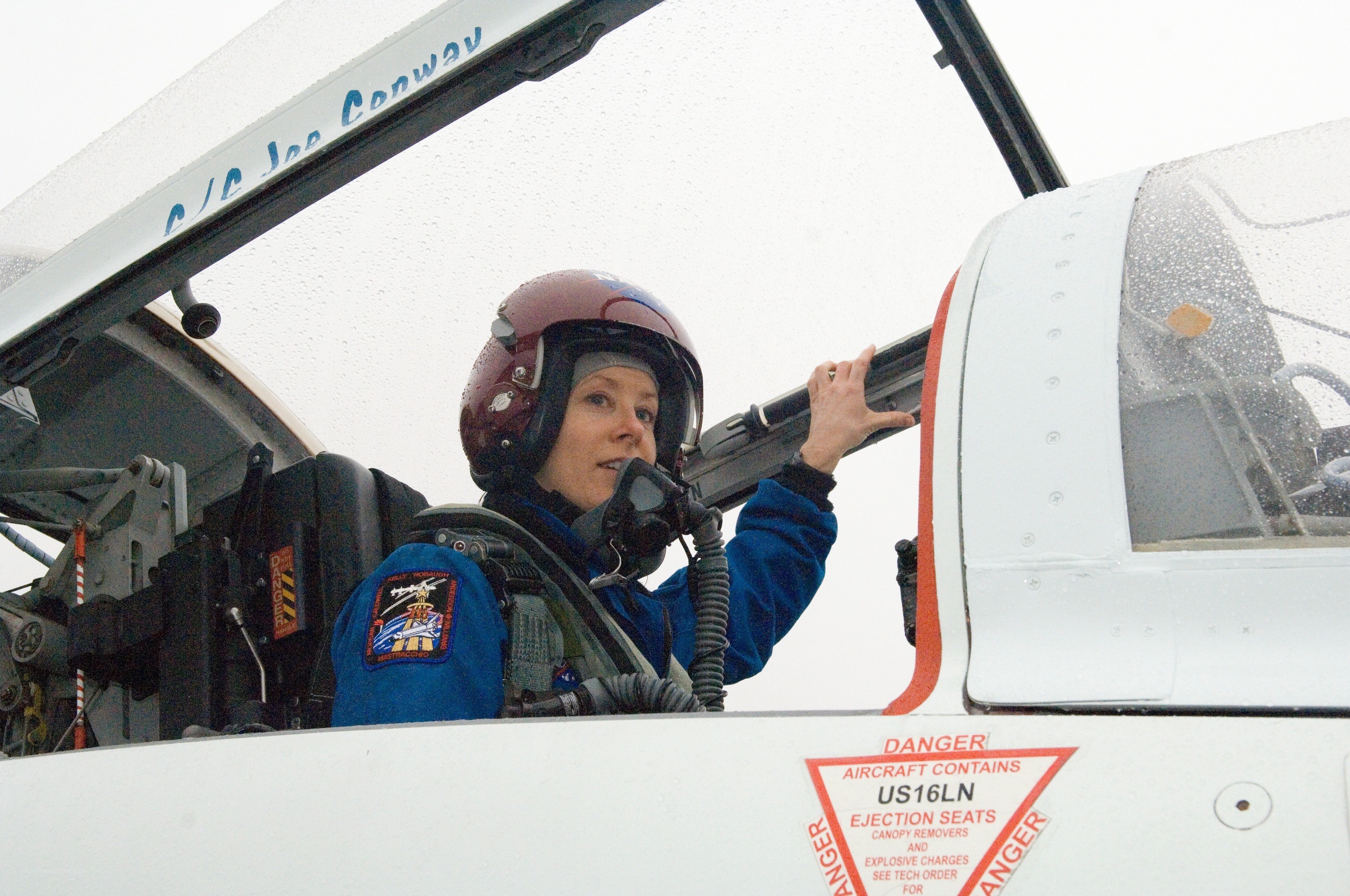 female pilot in cockpit