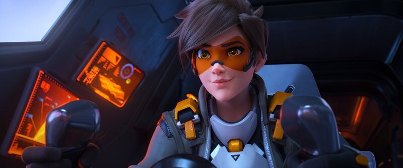 Female Pilot in Cockpit — Orange