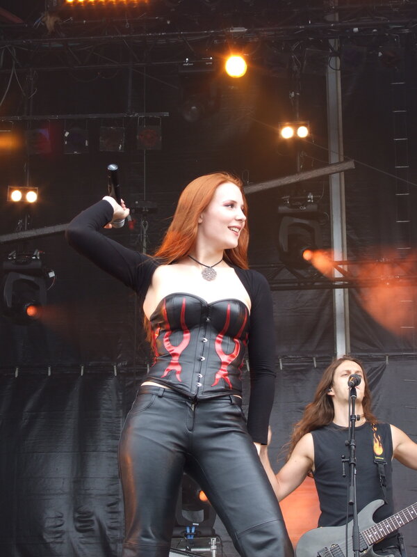 Female singer on stage at concert