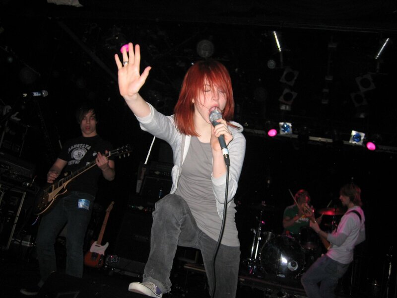 Female Singer on Stage — Black, Energetic, Night