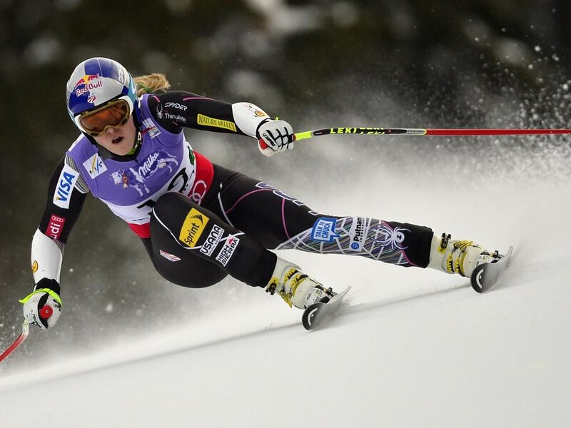 Female Skier in Action — White, Dynamic, Winter
