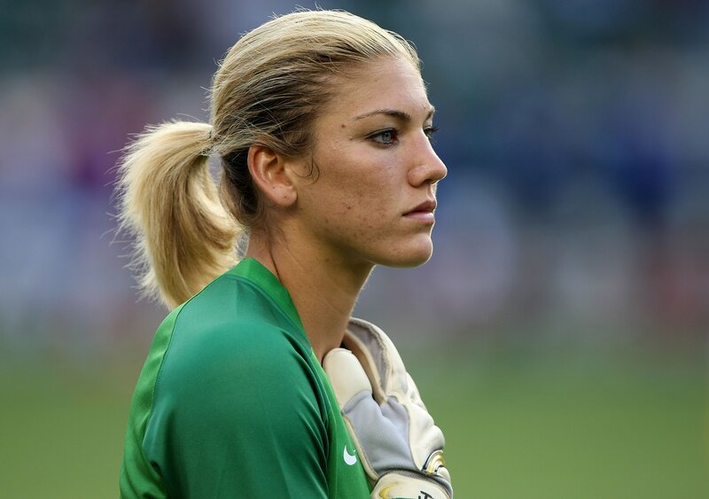 female soccer goalkeeper in profile