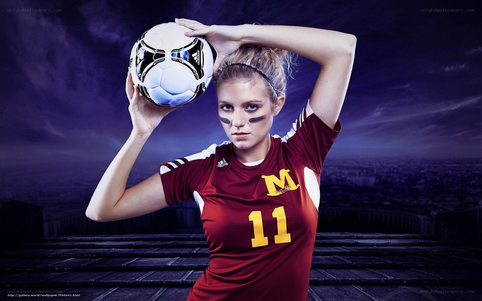 female soccer player with ball