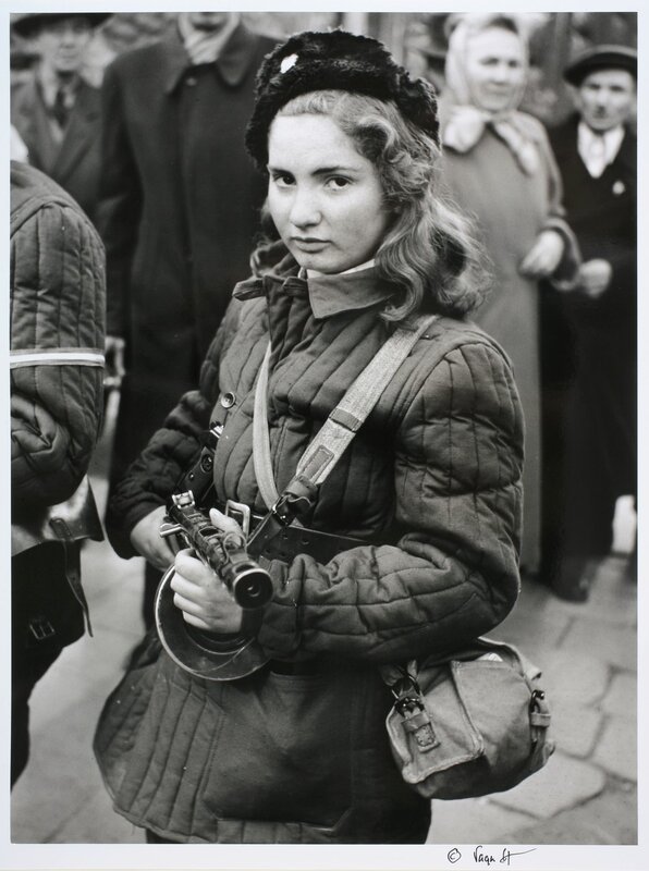 Female soldier with rifle