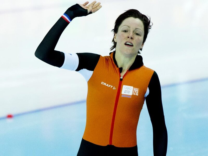 Female Speed Skater — Orange, Athletic