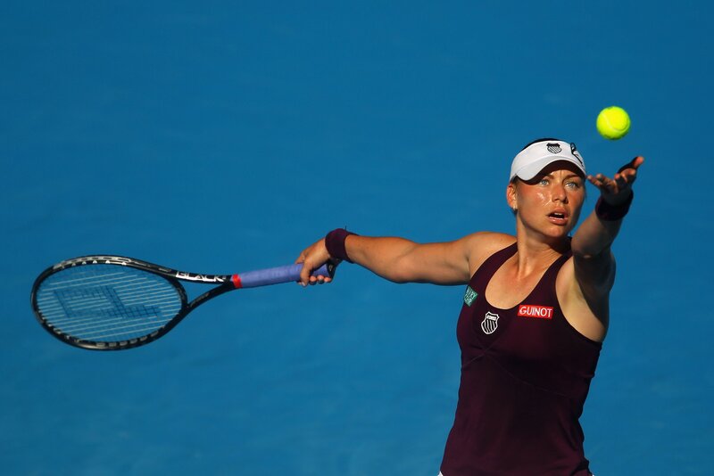 Female Tennis Player — Blue, Focused, Afternoon