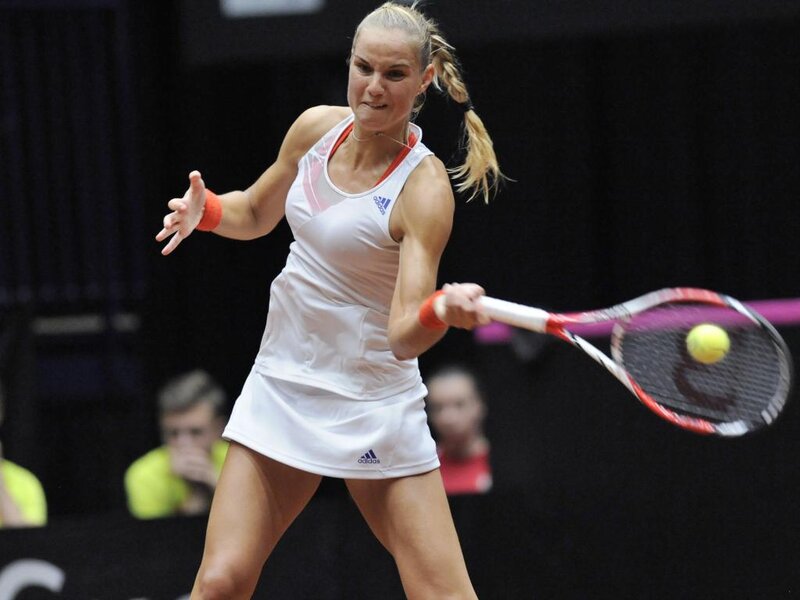 Female Tennis Player — White, Intense, Photograph