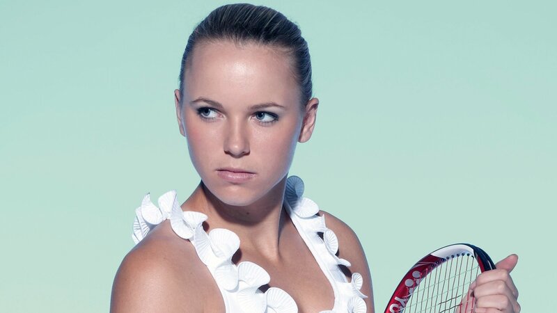 female tennis player with racket