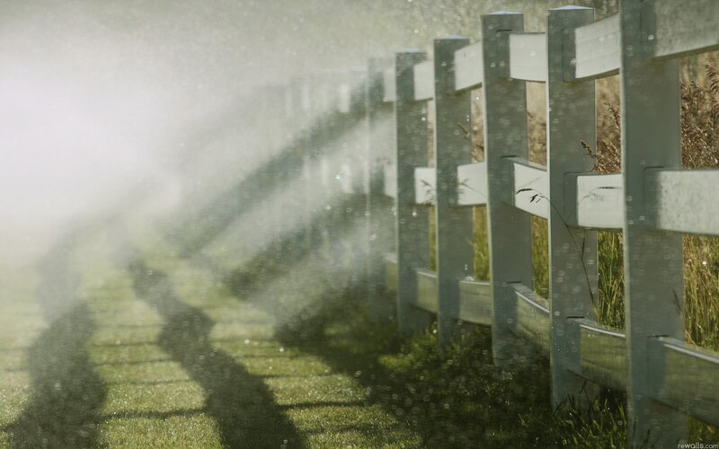 Fence with water spray