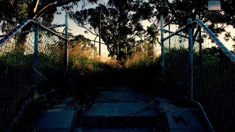 Fenced path at dusk