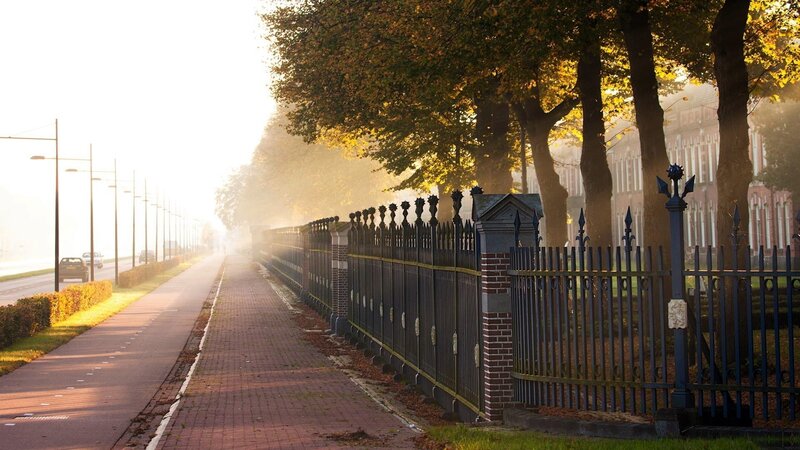 Fenced Walkway at Sunrise