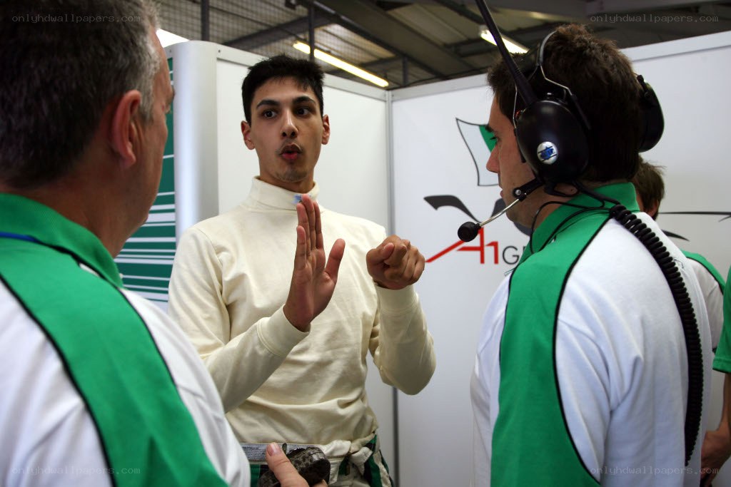 Fencer in discussion with team