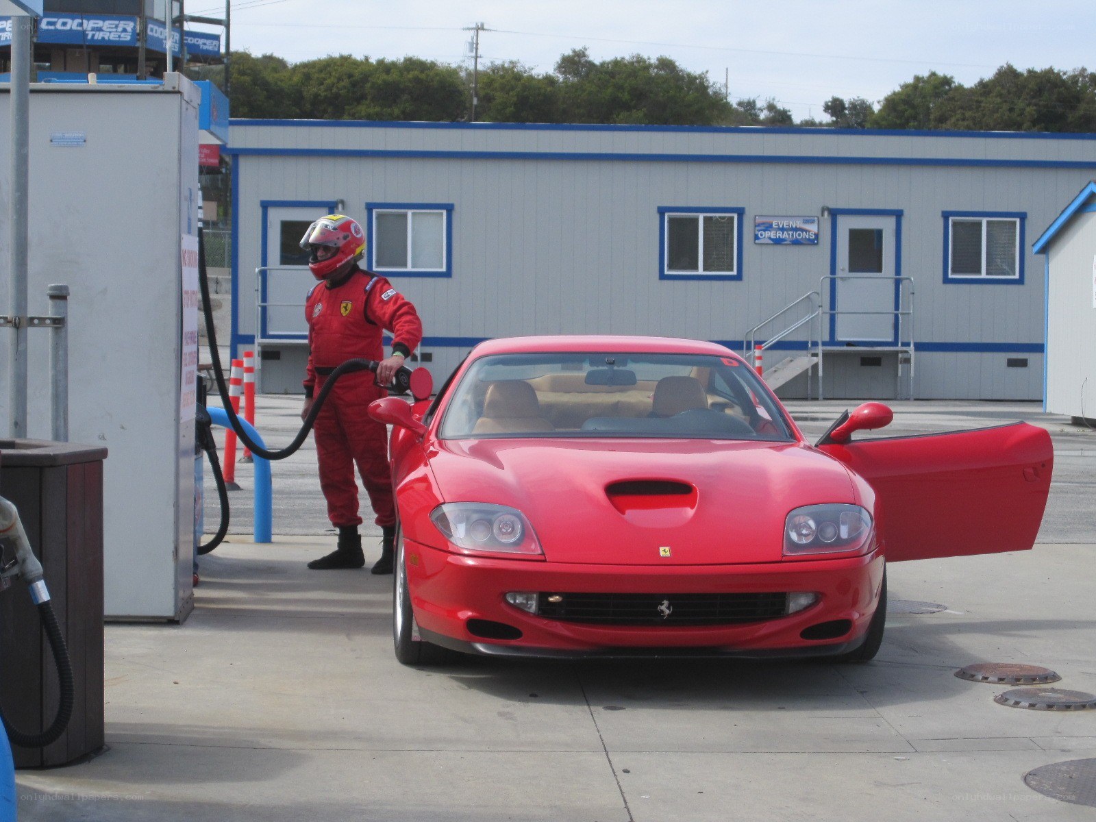 Ferrari at a gas station