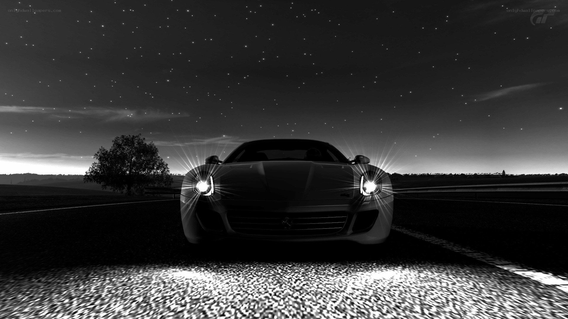 Ferrari at night on a road