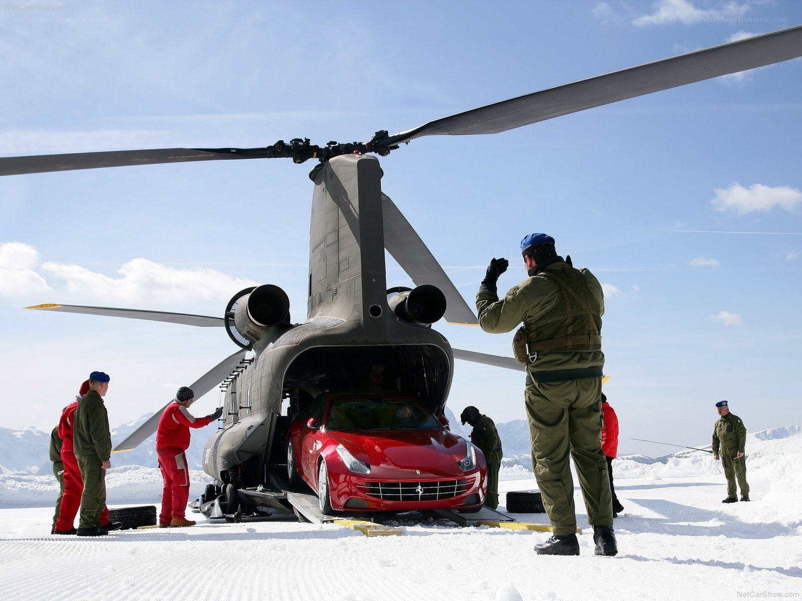 Ferrari being loaded into helicopter