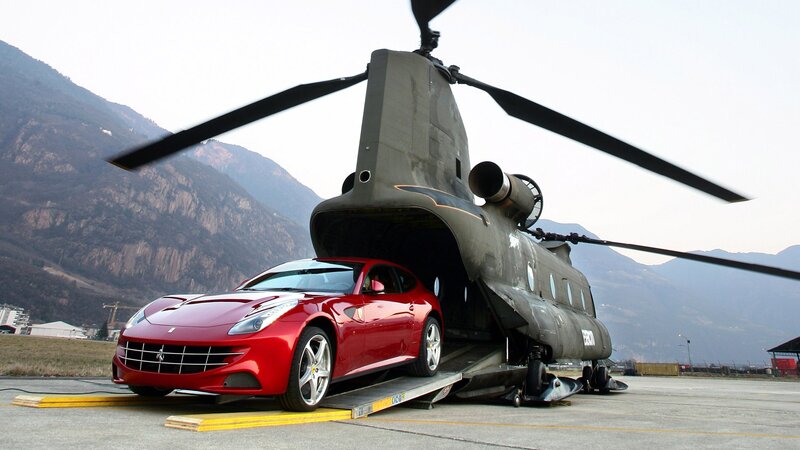 Ferrari being loaded into helicopter