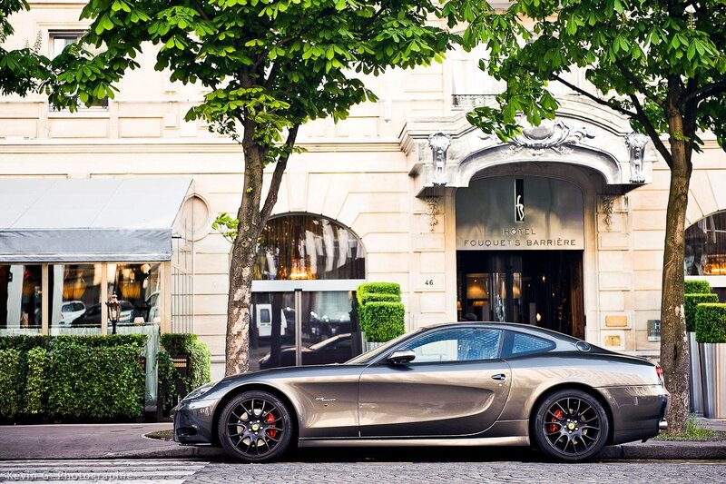 Ferrari car in front of hotel