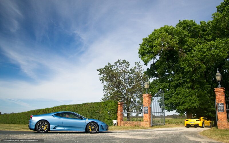 Ferrari cars at a gated estate
