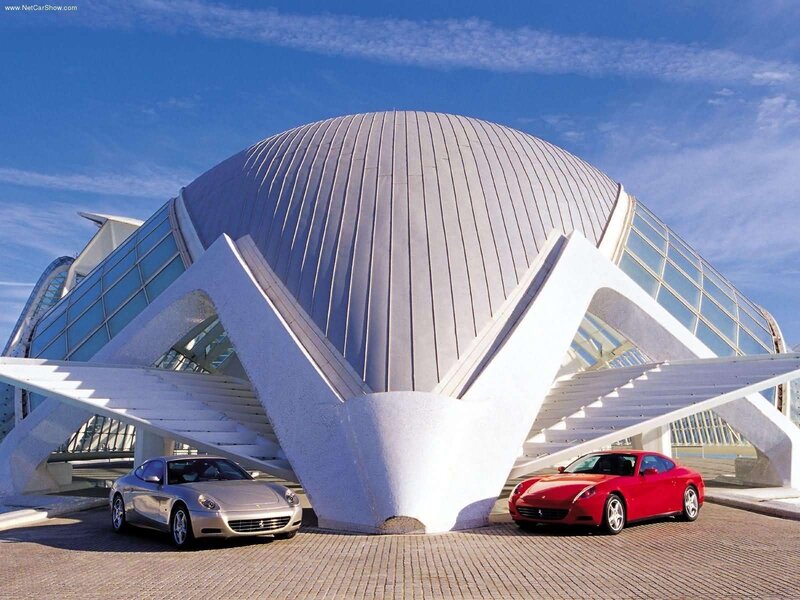Ferrari cars at modern building
