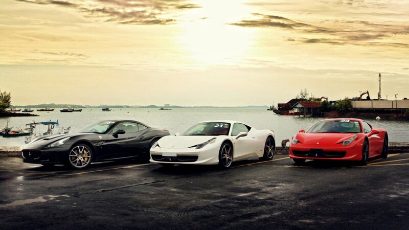 Ferrari cars at sunset