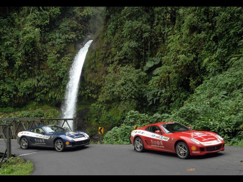 Ferrari cars at waterfall