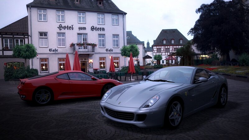 Ferrari cars in a town square