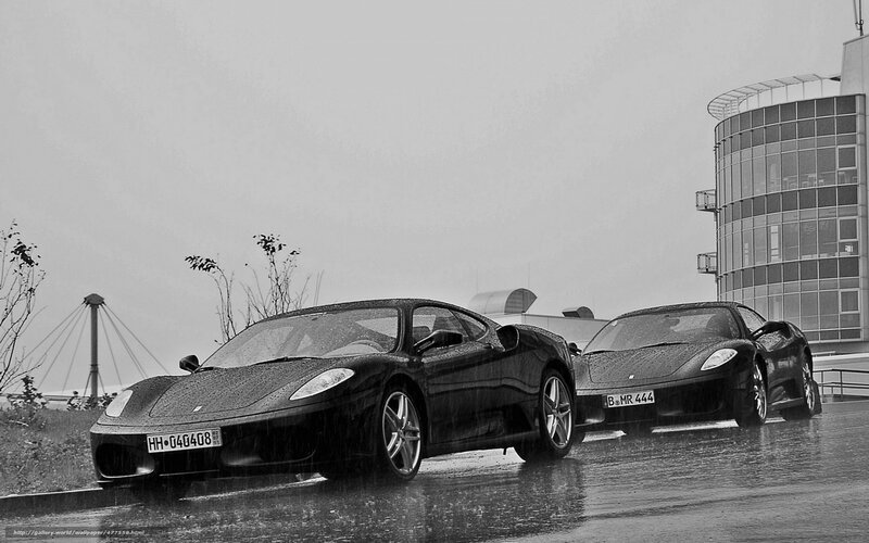 Ferrari cars in the rain